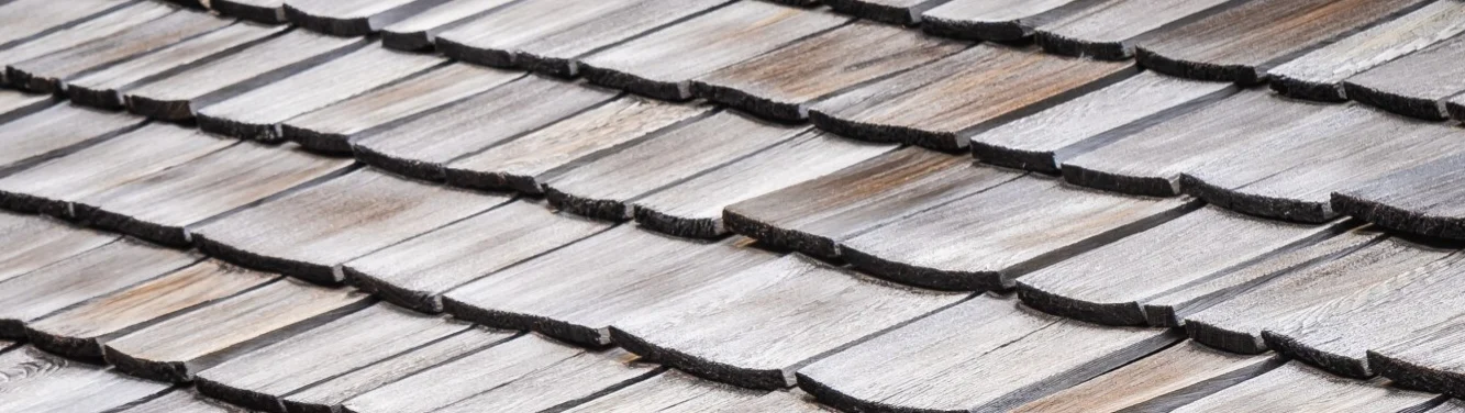 Close-up image of pale cedar shingles