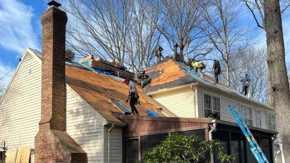 A wide, ground-level view of the Shiner team about to begin the installation of John’s new Northern Virginia Roof